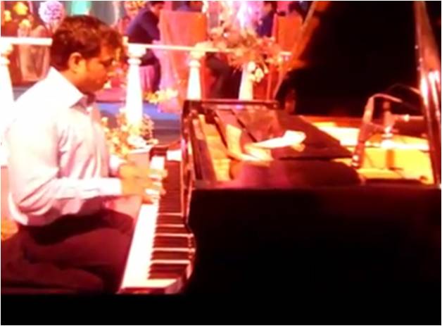 male piano player rajkot